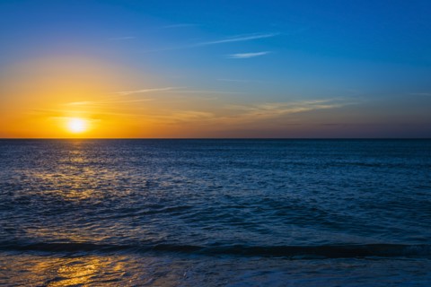 Beach and sea at sunset