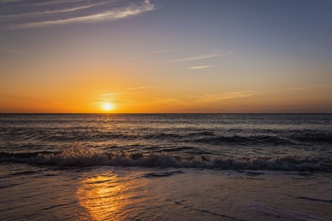 Beach and sea at sunset