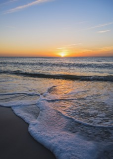 Beach and sea at sunset