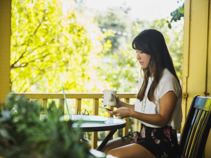 Young woman using phone