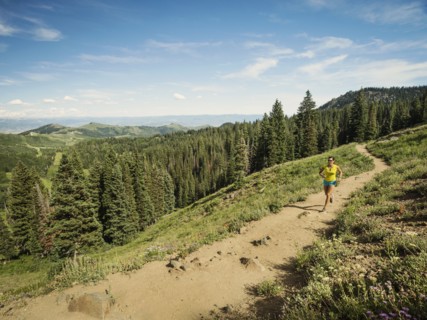 Mature woman running in mountains