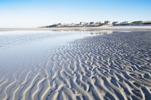 Beach at low tide with rippled sand