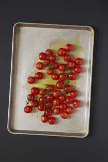 Cherry tomatoes on baking sheet