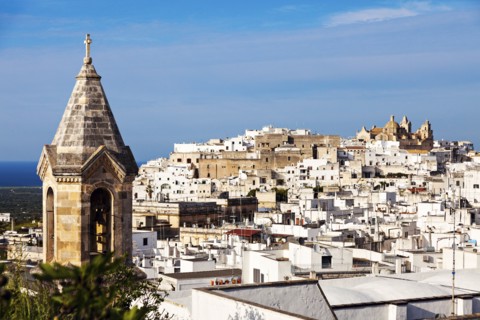 Townscape with church tower in foreground