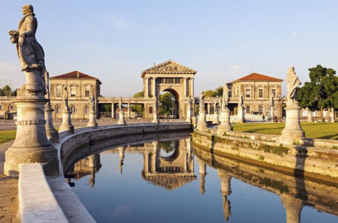 Prato della Valle with statues at dusk