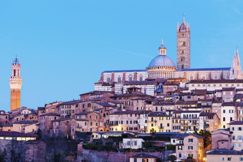 Townscape with Siena Cathedral against sky