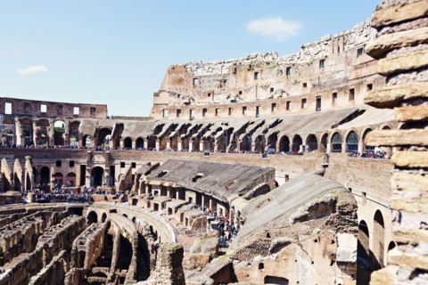 Ruins of Coliseum under blue sky