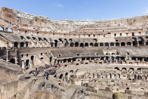 Ruins of Coliseum under blue sky