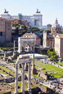 Roman Forum and Monument of Vittorio Emanuele II against sky