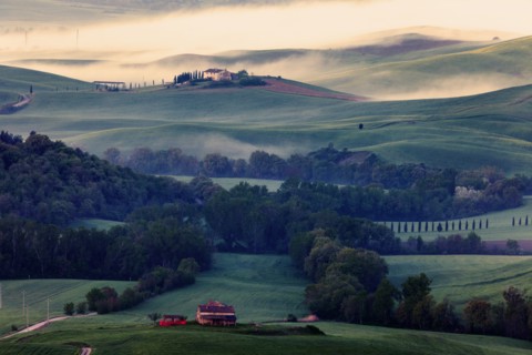 Rolling landscape with farmhouse