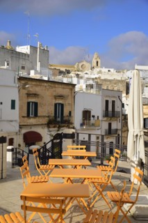 Cafe tables in Piazza della Liberta