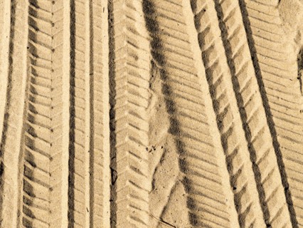 Tire tracks in sand