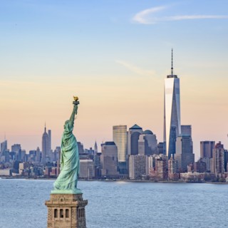 Statue of Liberty and One World Trade Centre. USA, New York, New York City.