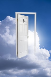 Opened door in clouds.