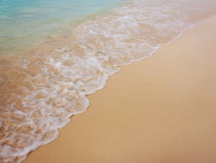 Surf on sandy beach