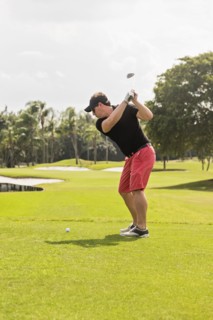Man swinging golf club