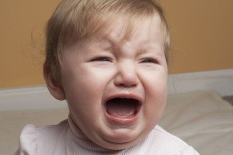 Portrait of baby girl crying