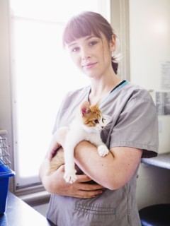 Portrait of vet with kitten