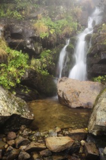 Dzembronskie waterfalls among rocks