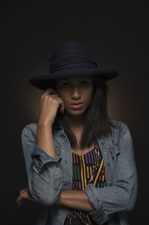 Portrait of woman looking at camera.