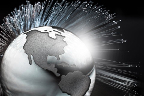 Illustration of fiber optics over globe.