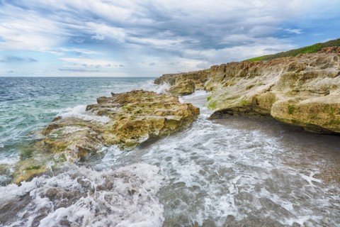Cloudy sky over coastline