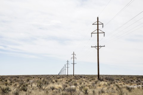 Electricity pylons in desert, Colorado