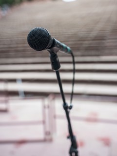 Microphone and empty amphitheater