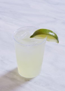 Margarita with lime on marble table