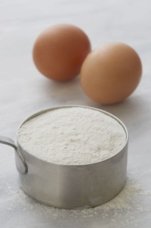 Eggs and cup of flour