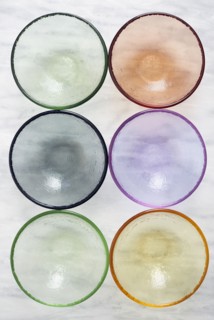 Overhead view of empty colorful glass bowls