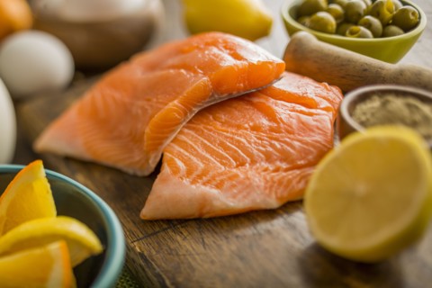 Fresh slices of salmon and lemon