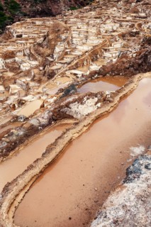 Peru, Cuzco, Sacred Valley, Maras, Aerial view of village with salt pools