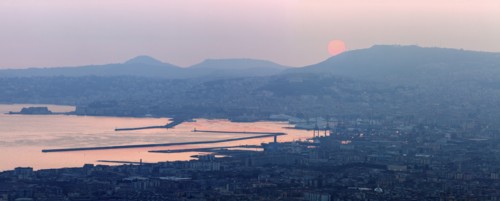 Italy, Campania, Naples, Panorama of city at sunrise