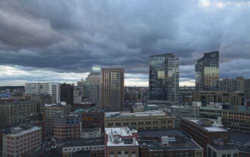 Massachusetts, Boston, City skyline with stormy sky