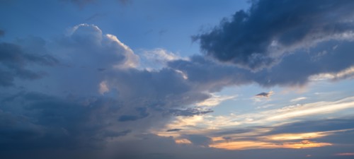 Clouds on sky at sunset.