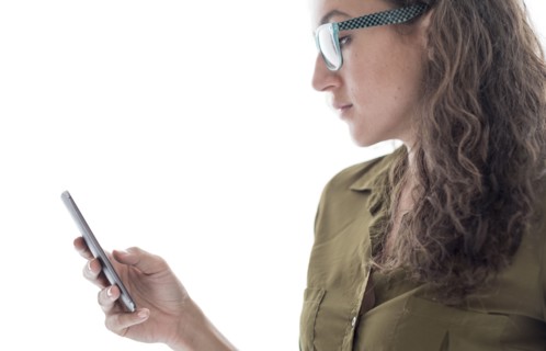 Young woman using smart phone.