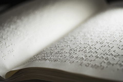 Book with Braille text.