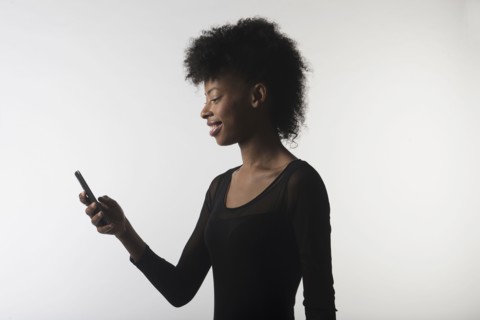 Young woman with mobile phone.