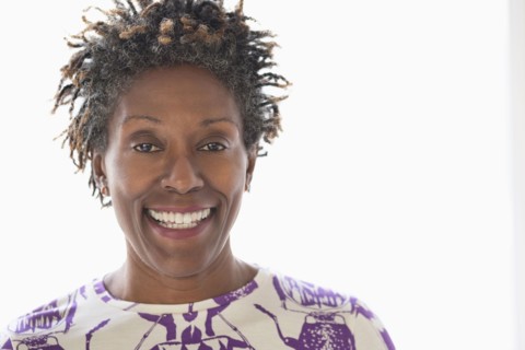 Portrait of smiling woman.