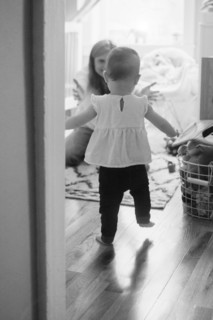 Daughter (18-23 months) walking towards mother