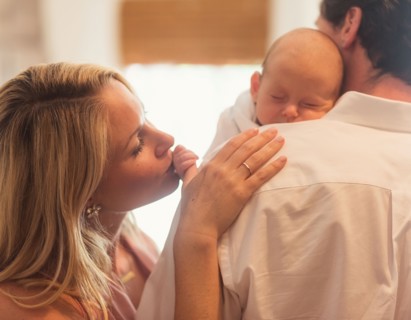 Couple with baby son (0-1 months)