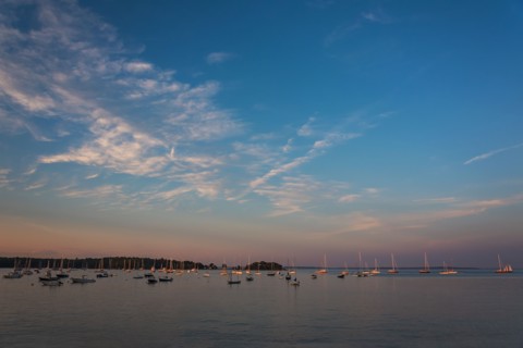 USA, Maine, Camden, Sailboats at sunset