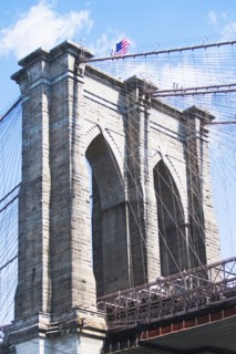 USA, New York State, New York City, Brooklyn bridge detail with American flag on top