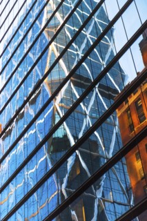 USA, New York, New York City, Glass facade of office building