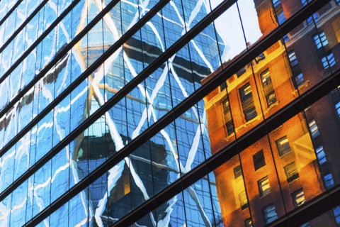 USA, New York, New York City, Glass facade of office building
