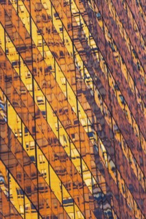 USA, New York, New York City, Glass facade of office building