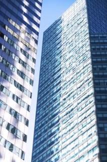 USA, New York, New York City, Glass facade of office buildings