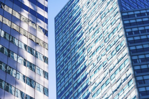 USA, New York, New York City, Glass facade of office buildings