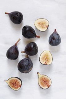 Figs lying on marble table